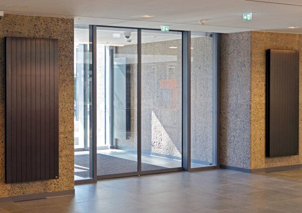 Вертикальные радиаторы отопления: виды + преимущества и недостатки + обзор марок