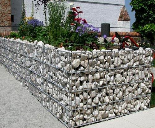 Заборы из камня в сетке Заборы из камня в сетке